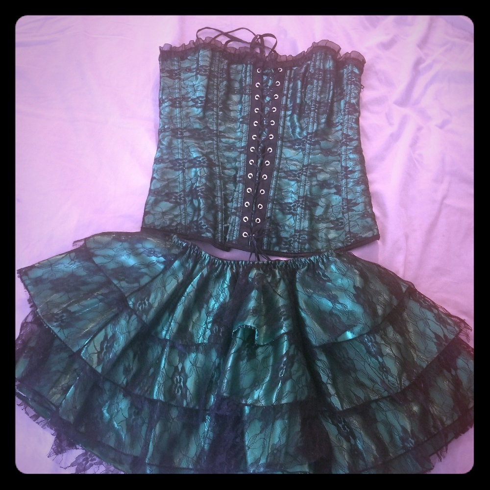Green corset and skirt.